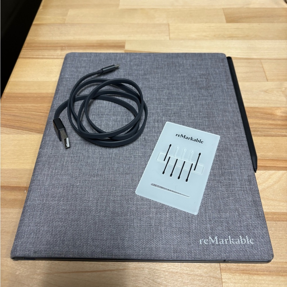 reMarkable 2 Tablet with Case, Charger, Pencil, and Spare Tips.